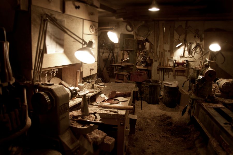 Well-equipped workshop with tools and workbenches
