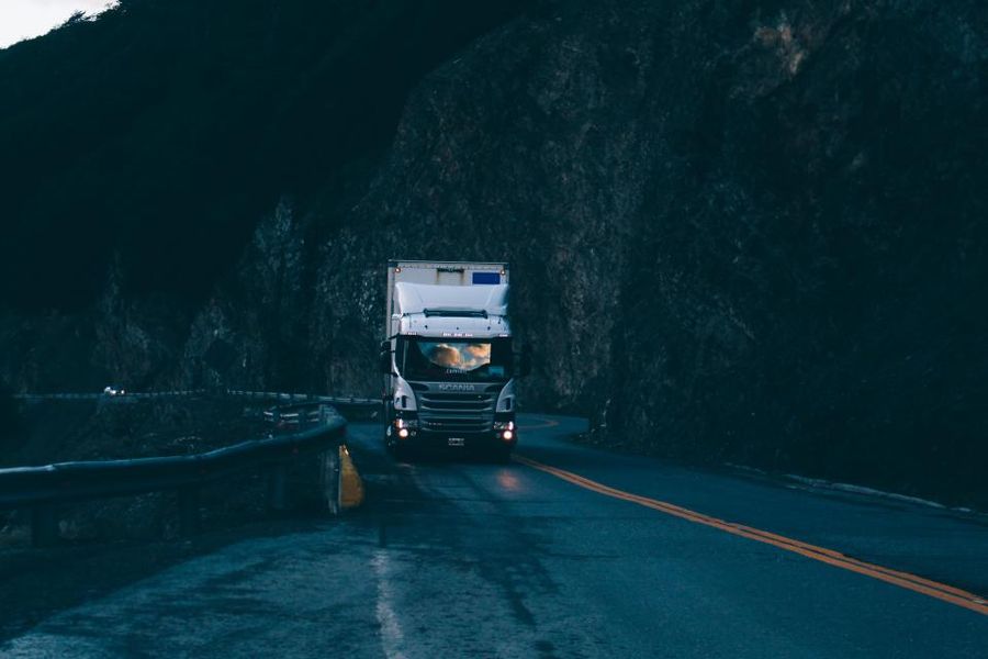Delivery truck travelling a coastal highway